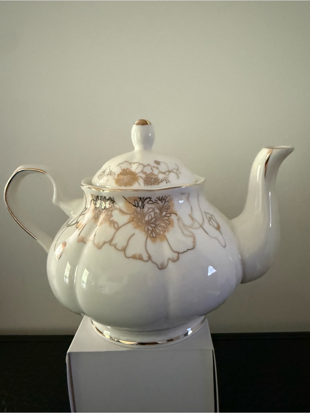 Elegant White Porcelain Teapot with Gold Floral Accents beautiful condition